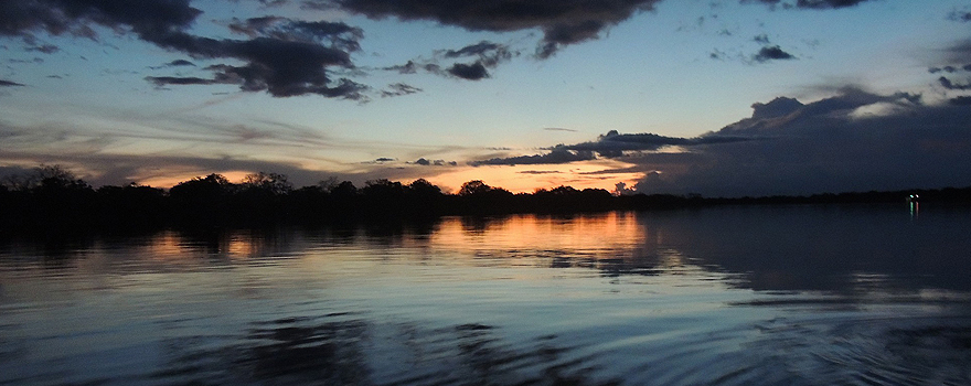 Sunset on the Amazon River in Brazil [Pixabay].