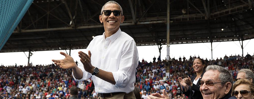 Barack Obama and Raúl Castro, at the baseball game they attended during the U.S. president's 2016 visit to Cuba visit [Pete Souza/White House].