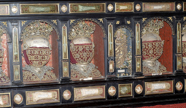 Detail of the reliquary cupboard of the conference room Capitular of Recoletas with the reliquaries adorned with embroidery and pearls.