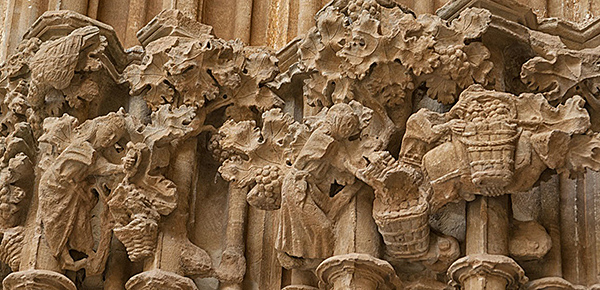 Grape harvest scene on the Gothic façade of Ujué, third quarter of the 14th century.