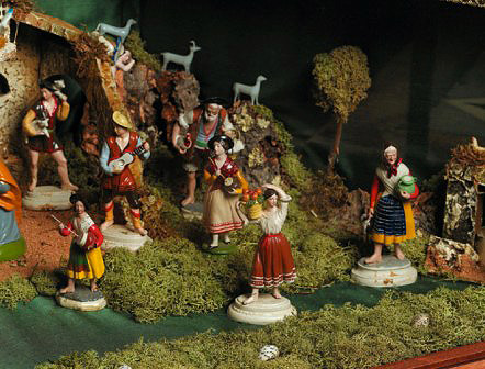 Detail of shepherds and offerers in a traditional nativity scene