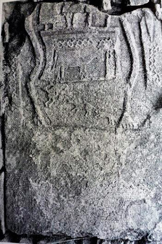 Funerary stele showing various figures, a hunting scene and large vine stalks.