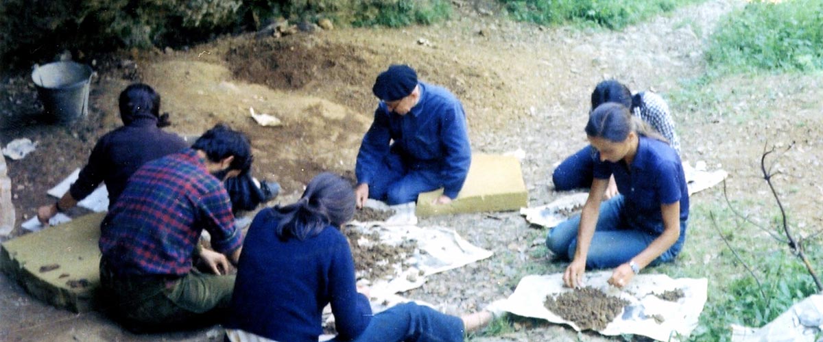 J.M. de Barandiaran excavating in the Axlor Cave, 1972, with several disciples.