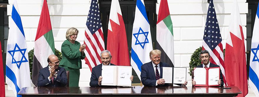 Bahraini and UAE foreign ministers sign Abraham Accords with Israeli premier in September 2020 [White House].
